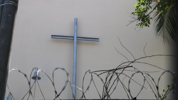 Cross and  barbed wire